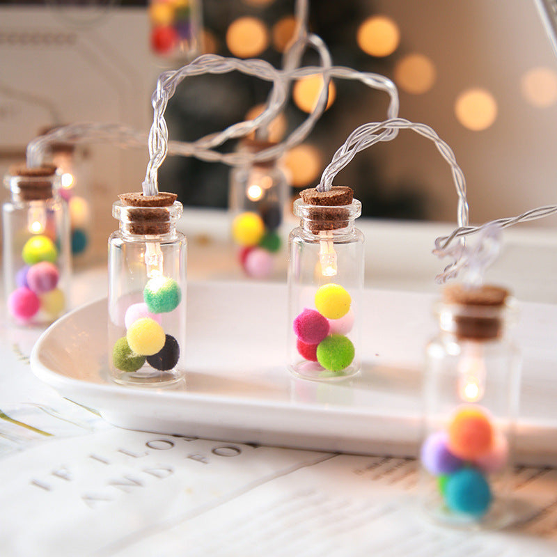 LED-slinger met glazen flesjes / 4 designs